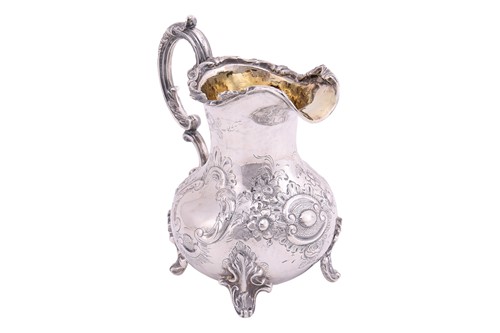 Lot 260 - A Victorian silver milk jug, London 1851, by...