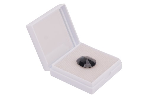 Lot 165 - A natural loose sapphire, very dark blue,...