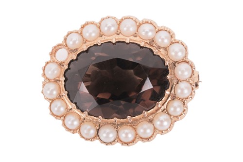 Lot 9 - A 9ct gold smokey quartz and pearl brooch, of...