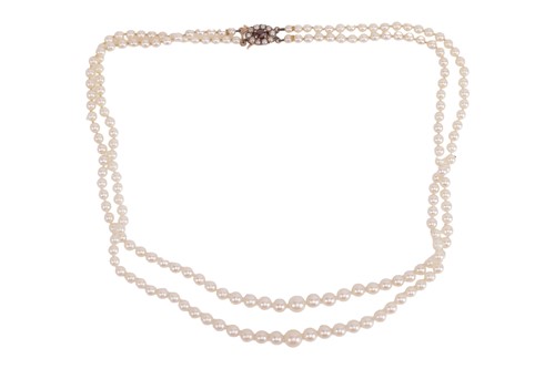 Lot 44 - A two row pearl necklace, of graduated...