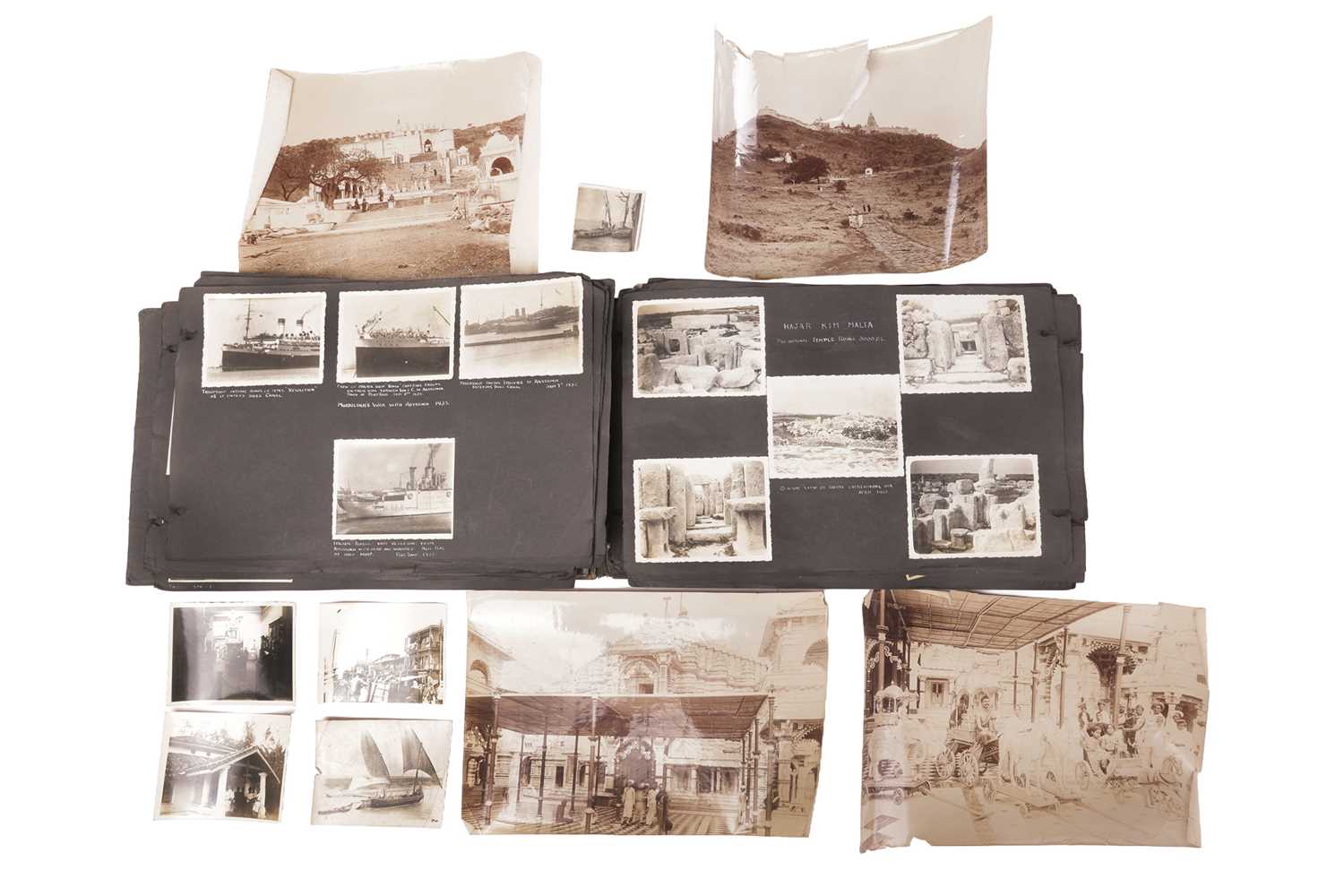 Lot 83 - An early 20th-century world photograph album,...