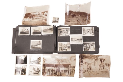 Lot 83 - An early 20th-century world photograph album,...