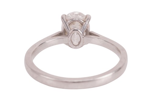 Lot 184 - A diamond solitaire ring, featuring a central...