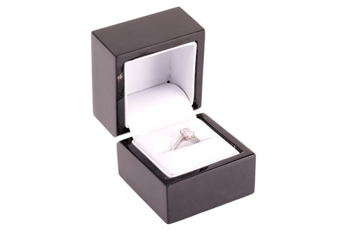 Lot 184 - A diamond solitaire ring, featuring a central...