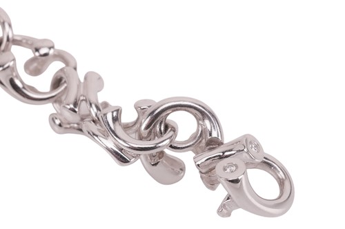 Lot 169 - Georg Jensen - A diamond-set ‘Magic’ link...