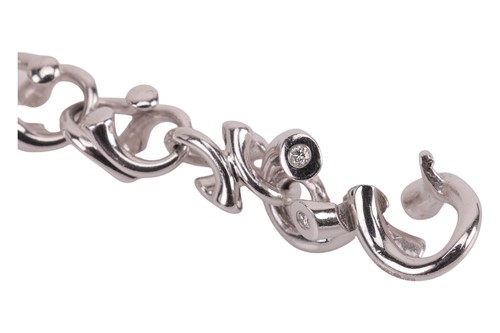 Lot 169 - Georg Jensen - A diamond-set ‘Magic’ link...