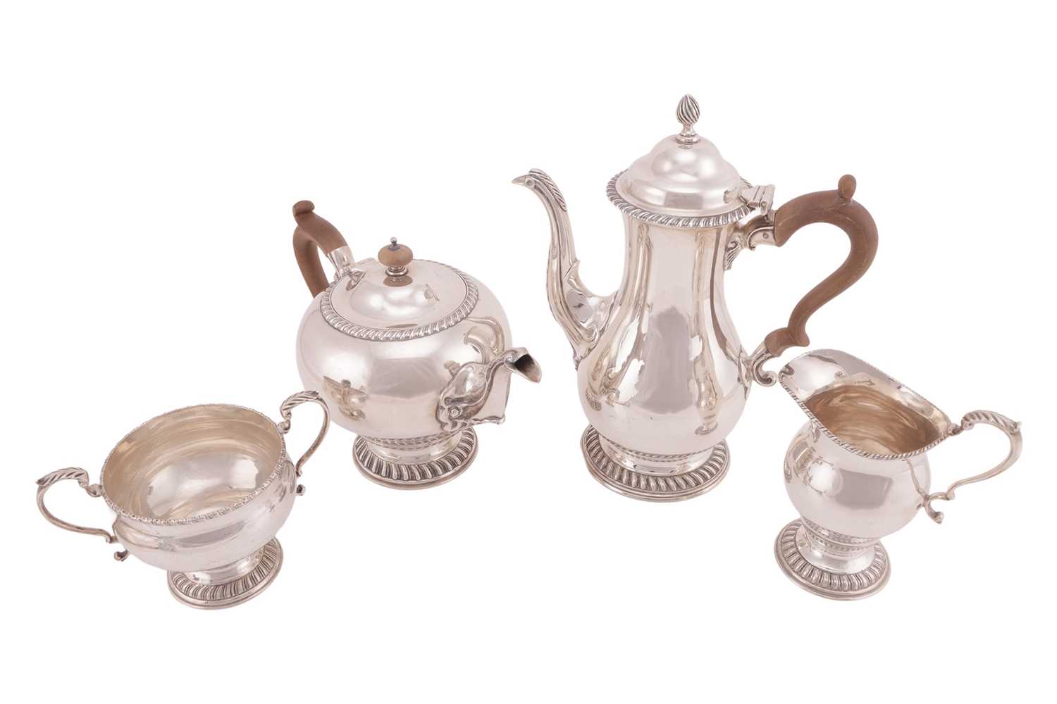 Lot 249 - A silver four-piece tea service, London 1956,...