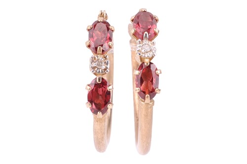 Lot 49 - A pair of hoop earrings set with oval-cut...
