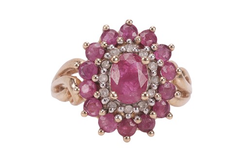Lot 128 - A 9ct ruby and diamond cluster ring, with open...