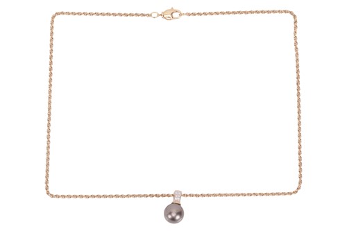 Lot 104 - A cultured pearl and diamond pendant on chain,...