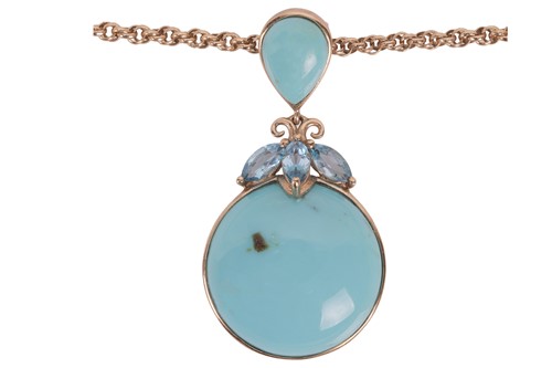 Lot 125 - An imitation turquoise and blue topaz pendant...