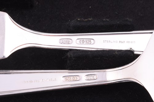 Lot 280 - A cased silver canteen of ‘Art Deco’ pattern...