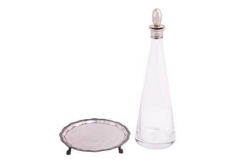Lot 264 - Mappin and Webb - a glass decanter with silver...
