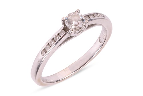 Lot 6 - A diamond solitaire ring, featuring a round...