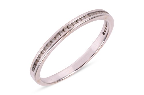 Lot 51 - A diamond half-eternity ring, featuring thirty-...