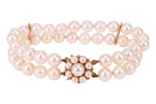 Lot 105 - A two row cultured pearl bracelet, comprising...