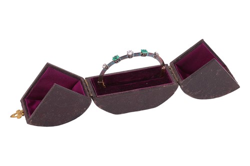 Lot 9 - An Early Victorian emerald and diamond bangle,...