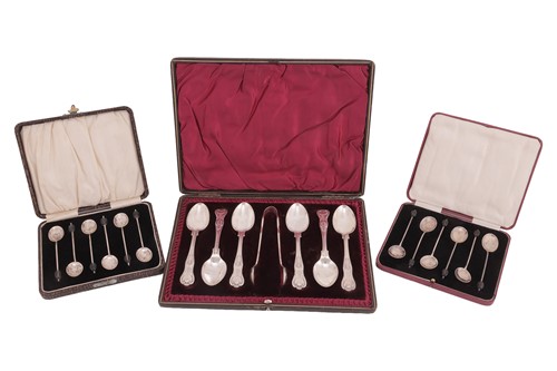 Lot 251 - Three cased sets of silver spoons, to include,...