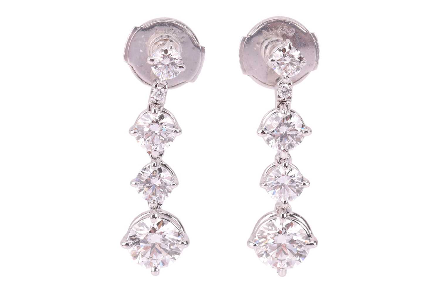Lot 193 - De Beers - A pair of Arpeggia single line drop...