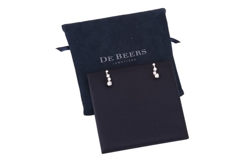 Lot 193 - De Beers - A pair of Arpeggia single line drop...