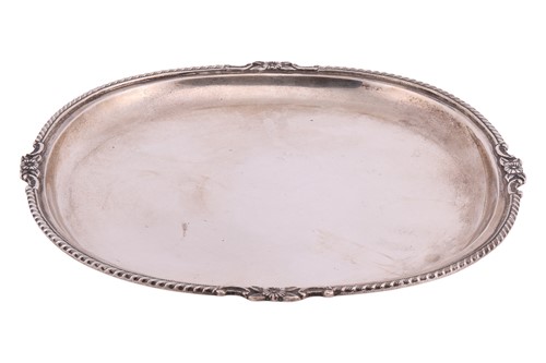Lot 270 - A white metal tray of rounded rectangular form,...