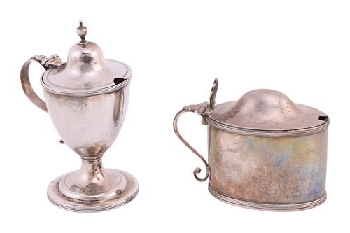 Lot 243 - Two George III silver mustard pots; the first...