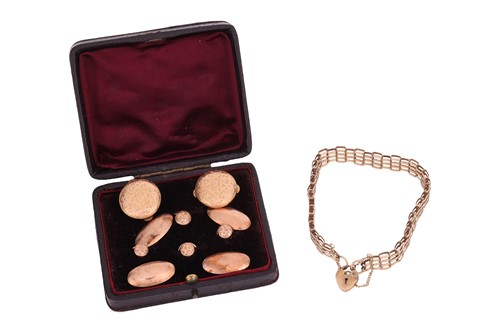 Lot 54 - A 9ct gold gate bracelet with heart padlock,...