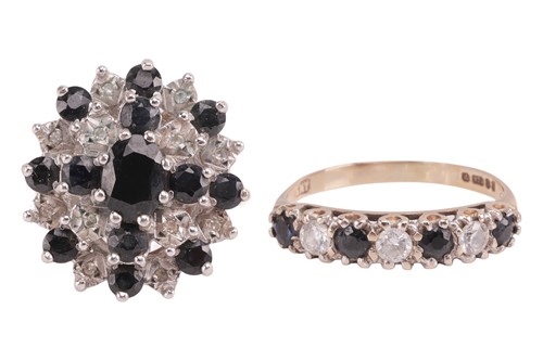 Lot 16 - Two 9ct gold sapphire rings, the first a...