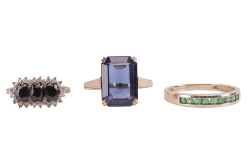 Lot 20 - Three rings, comprising a sapphire and diamond-...