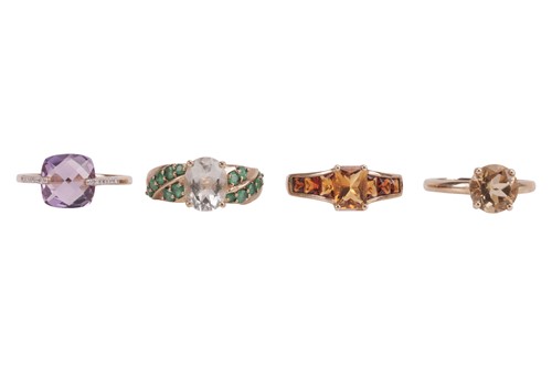 Lot 56 - Four 9ct gold gemset rings, comprising an...