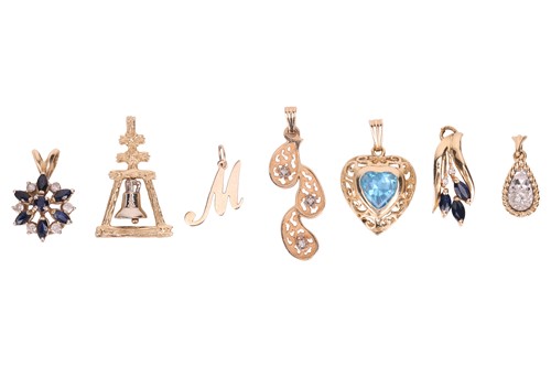 Lot 95 - A small group of seven pendant charms, all...