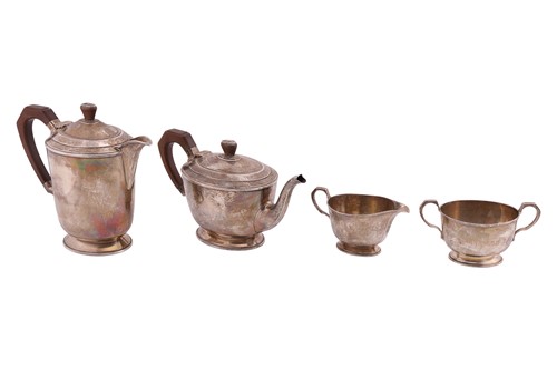 Lot A four piece Art Deco silver tea set, oval...