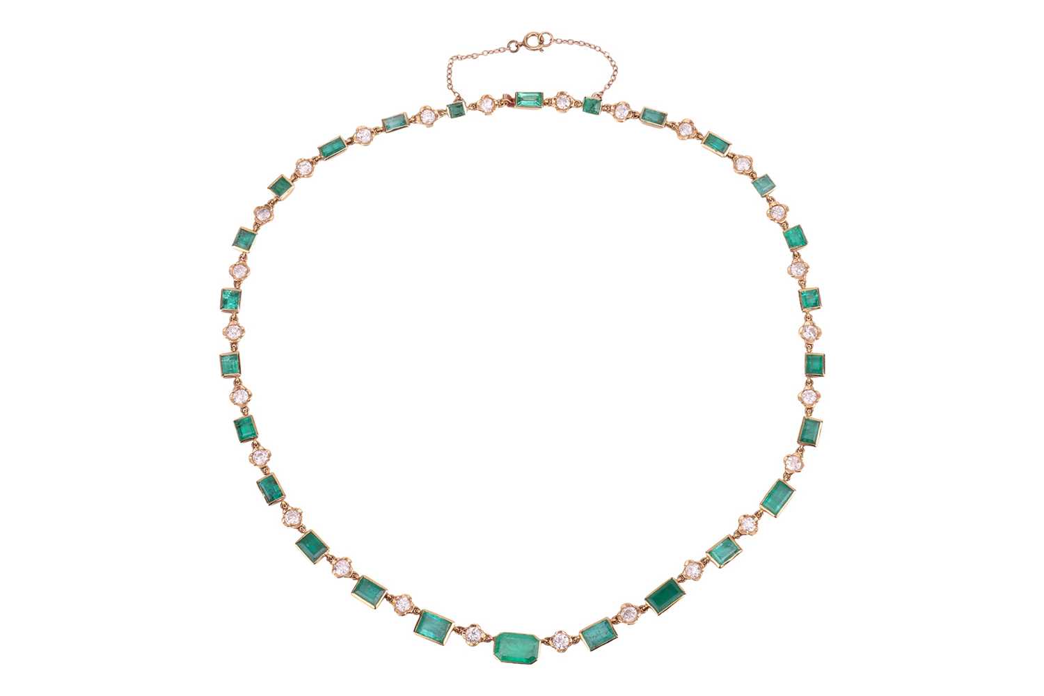 Lot An emerald and diamond necklace, comprising...