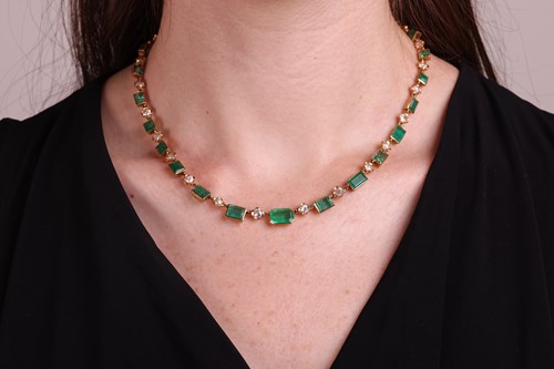 Lot An emerald and diamond necklace, comprising...