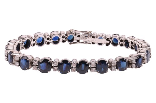 Lot A sapphire and diamond-set bracelet, featuring...
