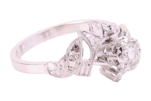 Lot A single-stone diamond ring, featuring an...