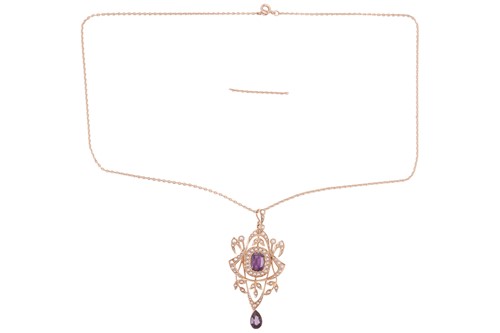 Lot An Edwardian amethyst and split pearl pendant...