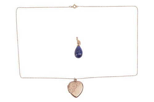 Lot 65 - A heart shaped locket on chain, the pendant...