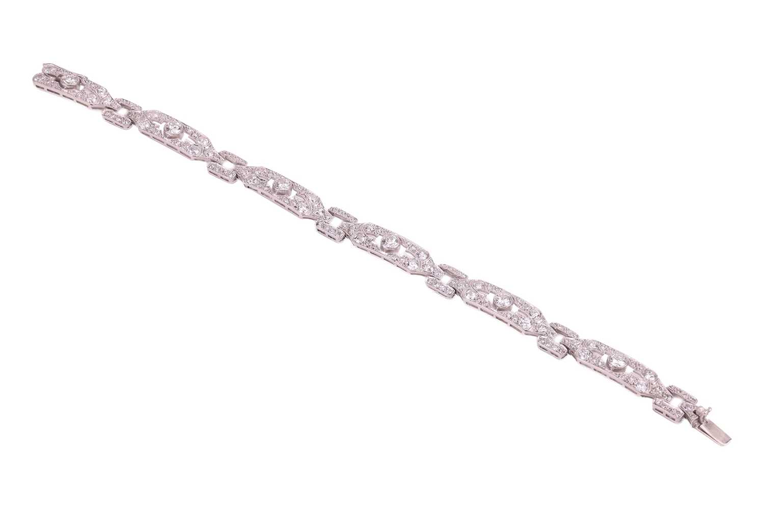 Lot 54 - An Edwardian diamond set bracelet, comprising...