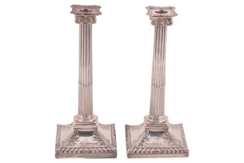 Lot 273 - A pair of George III silver Ionic column...