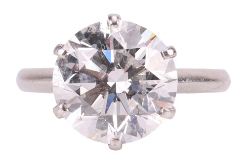 Lot A diamond solitaire ring, featuring a round...