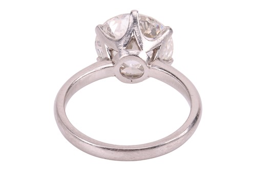 Lot A diamond solitaire ring, featuring a round...