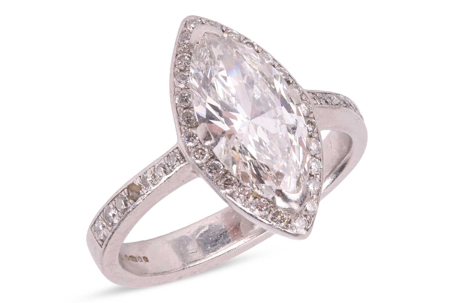 Lot A marquise-cut diamond ring, featuring a...