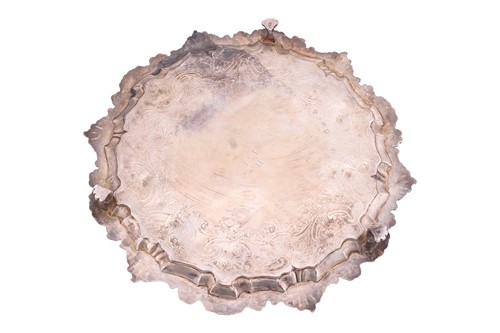 Lot 258 - A George II silver salver, shaped circular...