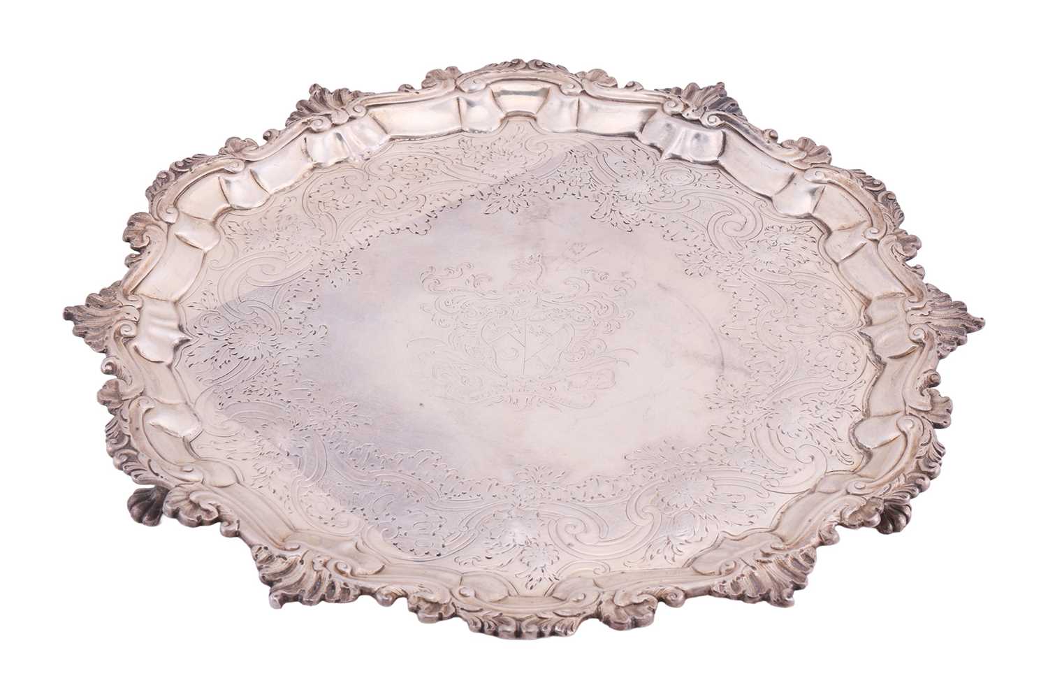 Lot 258 - A George II silver salver, shaped circular...