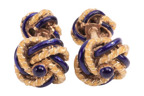 Lot A pair of enamel knot cufflinks, the knot...
