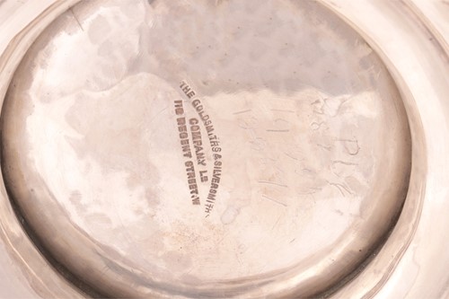Lot A silver baluster hot water jug of George I...