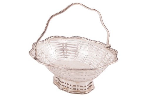 Lot An Edwardian small silver basket or sweetmeat...