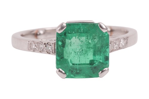 Lot A Colombian emerald dress ring, claw-set with...