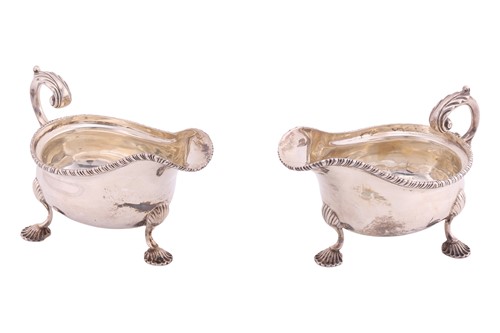 Lot 237 - A pair of silver sauce boats, London 1912 by...